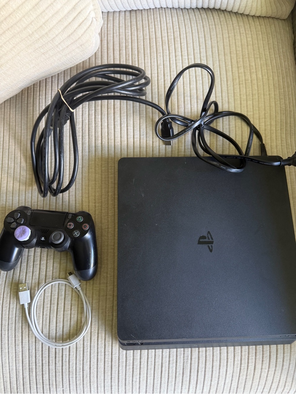 Sony Black PlayStation Slim Console with Controller and Cables